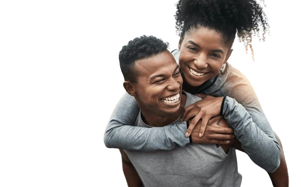Couple piggyback laughing